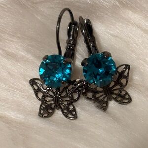 Butterfly Earrings with gorgeous Crystal Blue stone. Lever backs.